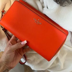 Kate Spade Orange wristlet wallet